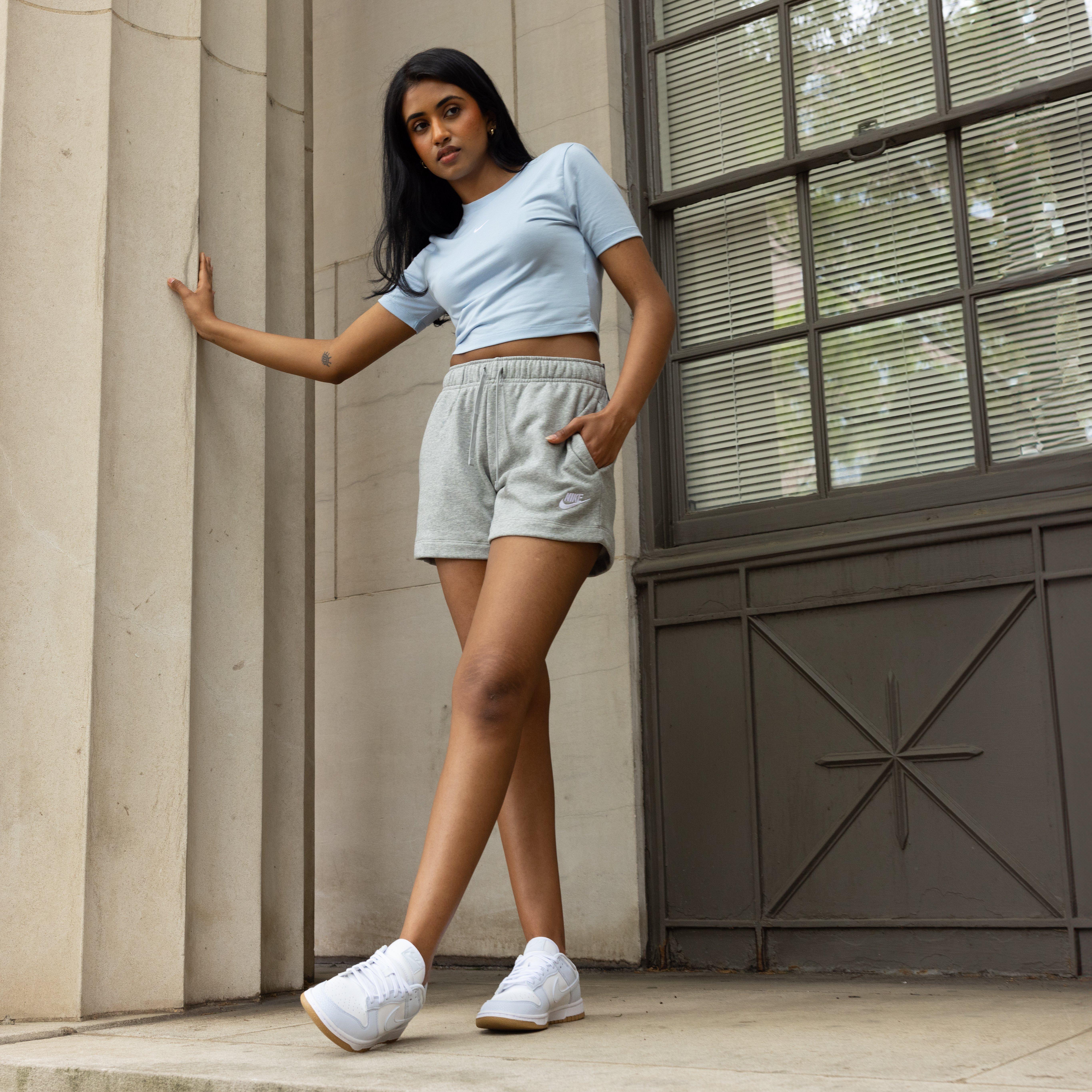 Nike Dunk Low Next Nature "Football Grey" - Model Posing in Shoe